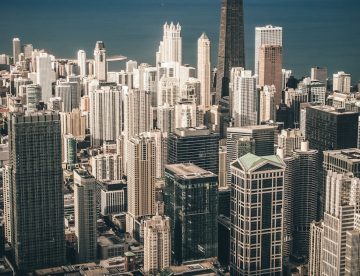aerial view photography of city buildings near body of water