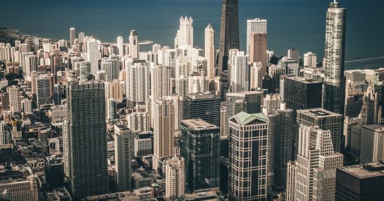 aerial view photography of city buildings near body of water